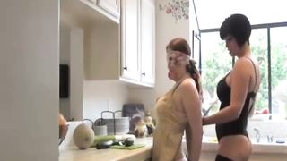 Mistress catches up with maid and puts cucumber in wet pussy