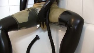 Young Latex Fetish Girl Fully Rubberized with Pisspants and Gasmask