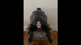 Latex sub in Bondage with Fucking Machine from behind