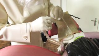 Bizarre enema and catheter latex dirndl Part 4 of 5