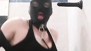 Submissive in bathroom