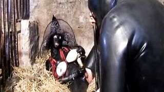 The Encasement Rubber Slave is Dominated by two Latex Mistresses in an old Shed - Part 2