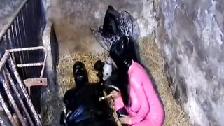 The Encasement Rubber Slave is Dominated by two Latex Mistresses in an old Shed - Part 3