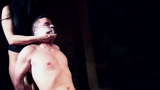 Clair Brooks and her prey bound down to a chair