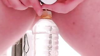 Girl tries to Hang Bottle from her Clamped Clit