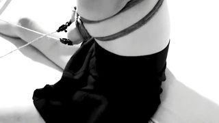 Tits bondage with her NIPPLES clamped to her TOES