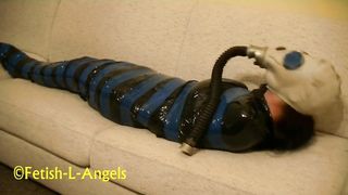 (SAFE AND VOLUNTARY), Mummification Slave Girl Relaxing in her Free Time before Service