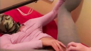 Lesbian dildo fucking-slapping pussy red, making her squirm and gasp