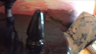 She's riding a huge Dildo