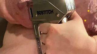 Self inflicted tit torture