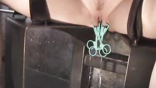 Dominating mistress duo tease sex slave babe's pussy with clamps