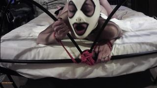 She's tied up on a bed with a front camera, you can see how hard she's fucked by her master
