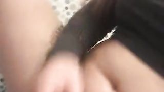 Redhead Asian masturbates in the bathroom