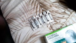 Glycerin suppositories pushed in the ass with a vibrator
