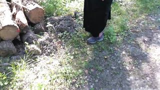 Ass spanking in black dress in public