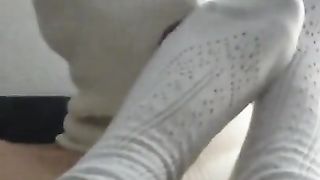 Footslave licks my feet and receives a footjob