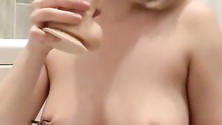 Hot blonde has an orgasm during a blowjob because of the new sensations from the nipple clamps