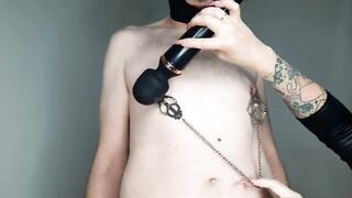 Games with a vibrator. Dominatrix Nika painfully plays with slave's nipples, balls and dick. BDSM