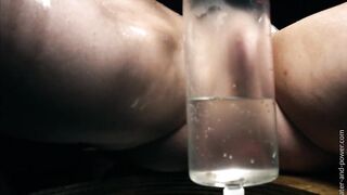 Lexi is strapped to the bondange bench and has her six pack inflated out of existence with an enema